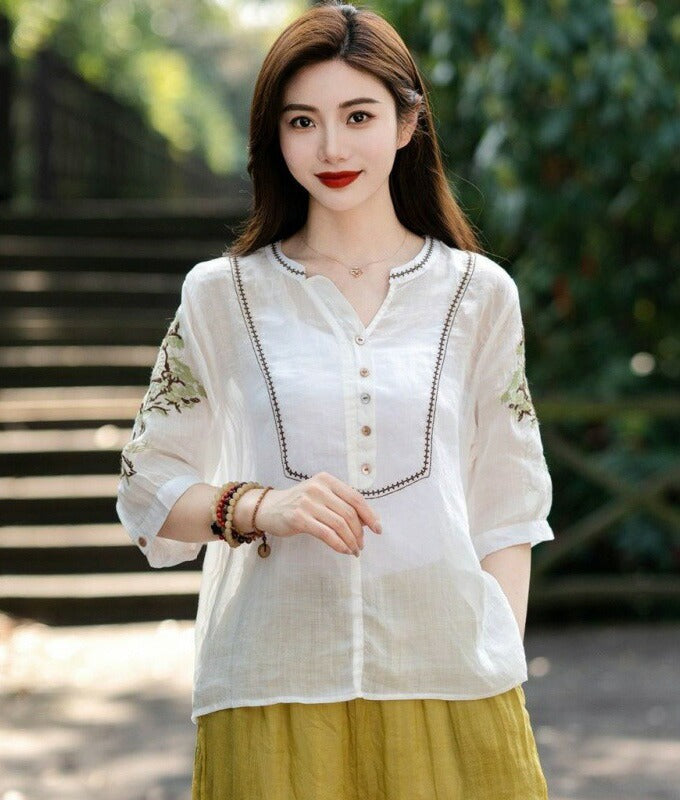 Sheer cotton blouse with flower embroidery