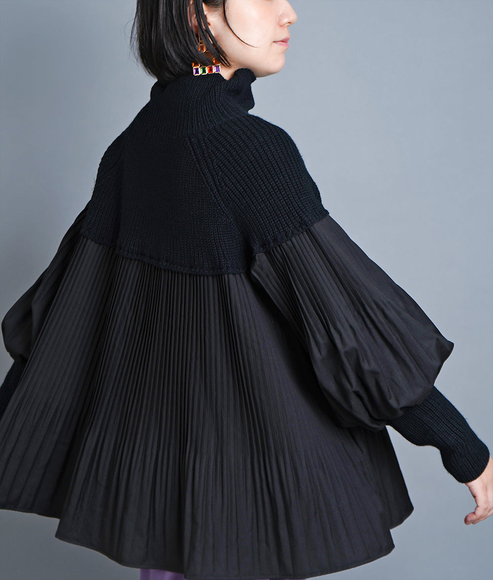Dramatic pleated high neck knit