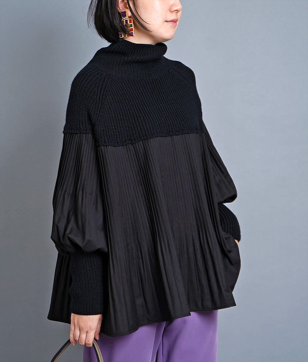 Dramatic pleated high neck knit