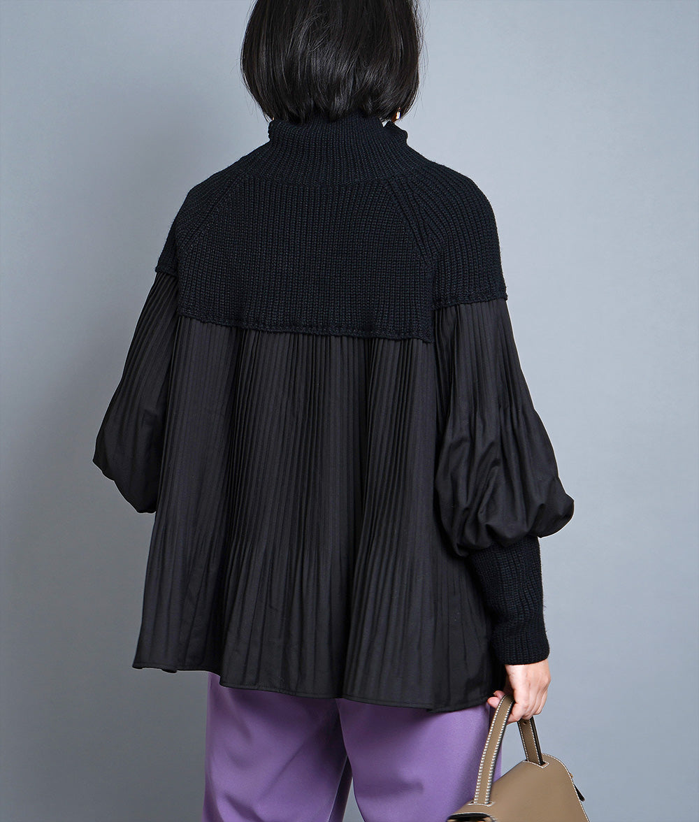 Dramatic pleated high neck knit