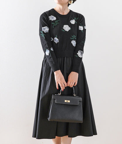 Black one-piece dress with lovely fragile flowers and embroidered flowers