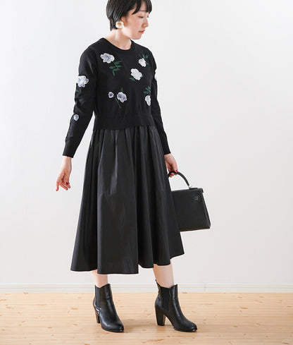 Black one-piece dress with lovely fragile flowers and embroidered flowers
