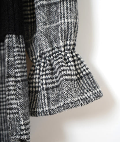 Cable knit and flannel check layered top