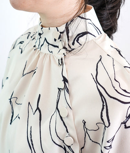 Elegant drawing print blouse with a high collar
