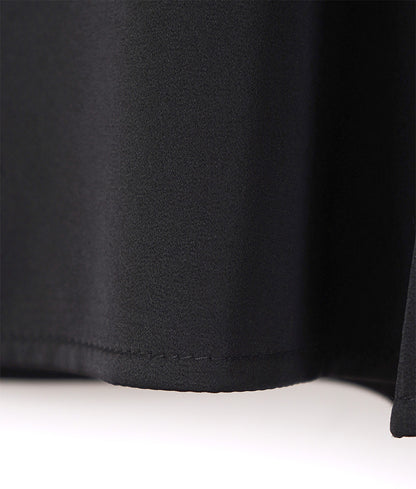Glossy blouse with embroidery and cross lines